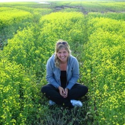 Here is Gail. Sitting in a field. 